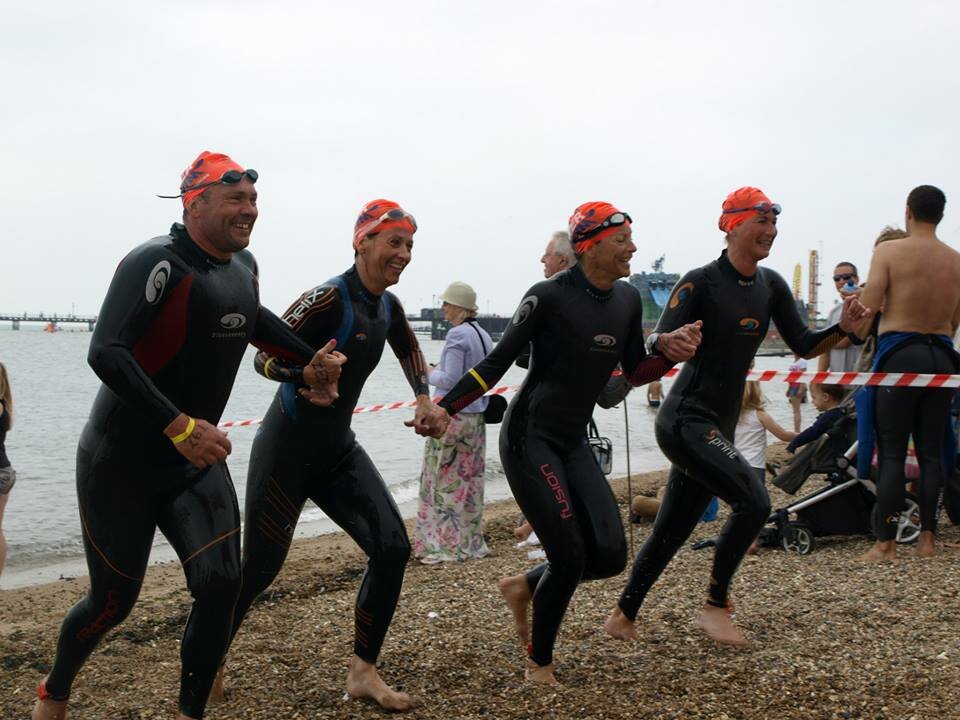 Participants taking part in The Great Pier Swim open water swimming
