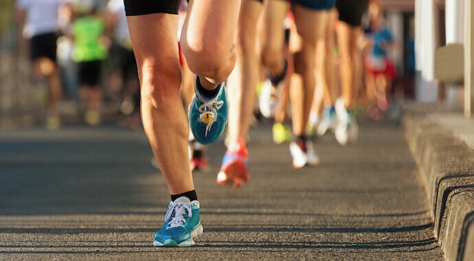 calories burnt running a half marathon runners taking part in a half marathon to burn calories
